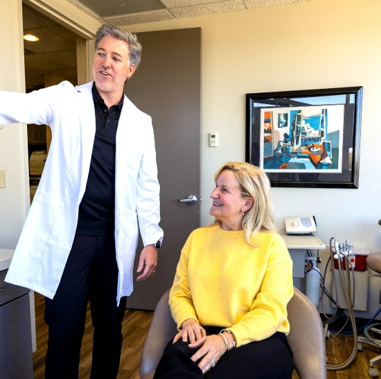 Friendly dental team member interacting with a patient at Dr. Andrew Jackson DDS in Nashville